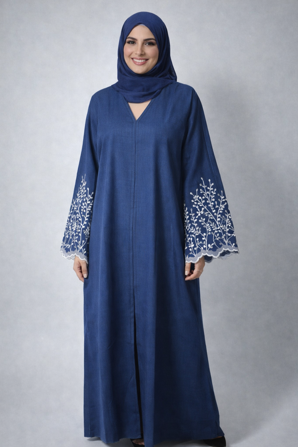Abaya Bleu brode blanc de fleur - collection dubai
